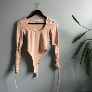 Never worn neutral body suit - super soft ☁️